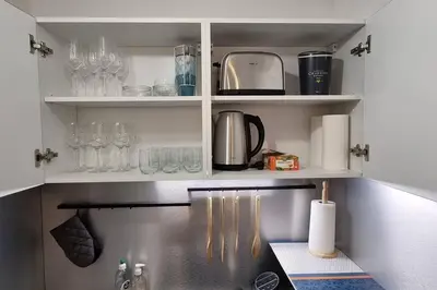 Cuisine ou kitchenette dans l'établissement Maisonnette design Le Cosy - Marché à 3mn à pied - Parking gratuit à 50m - Amazon Prime -
