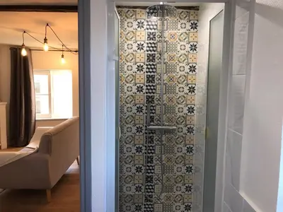 Salle de bains dans l'établissement Jungle Cosy Appartement