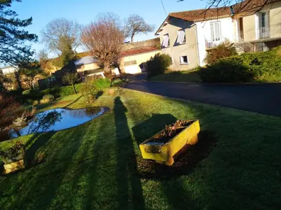 Jardin de l'établissement chambre privée chez l'habitant et partage des partie communes