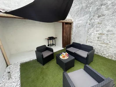 Coin salon dans l'établissement Le Boinot - Patio privé, wifi haut débit, Netflix, stationnement gratuit