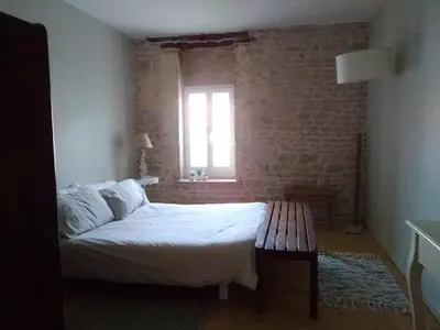 Un ou plusieurs lits dans un hébergement de l'établissement Chambres des Lunes