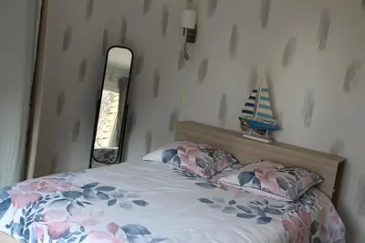 Un ou plusieurs lits dans un hébergement de l'établissement Route de l'océan/Maison 8 pers/entrée FOURAS