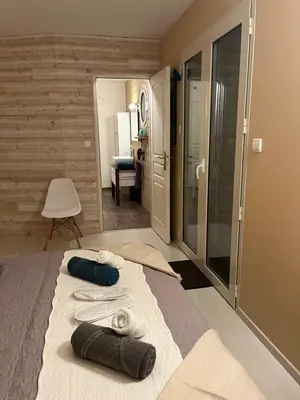 Un ou plusieurs lits dans un hébergement de l'établissement Chambres d hôtes Villa Anani Cosson alex