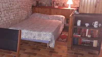 Un ou plusieurs lits dans un hébergement de l'établissement Chambre de caractere