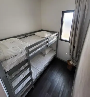 Un ou plusieurs lits dans un hébergement de l'établissement EMLAVIE - Maison familiale OU Loft SPA - à 3km Futuroscope