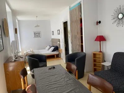 Coin salon dans l'établissement Logis B21