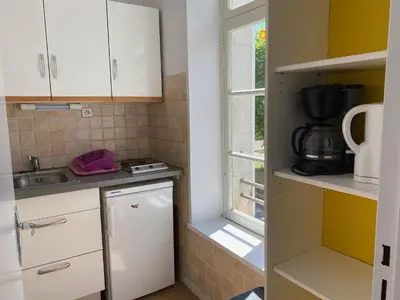 Cuisine ou kitchenette dans l'établissement Logis B21