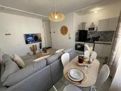 Cuisine ou kitchenette dans l'établissement Le Bohème - Centre Ville, Netflix et WIFI, parking, idéal familles, couples et voyages d'affaire