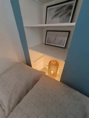 Un ou plusieurs lits dans un hébergement de l'établissement APPARTEMENT HYPER CENTRE - Place du Minage