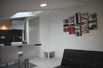 Coin salon dans l'établissement Comfortable Apartment In Downtown La Rochelle
