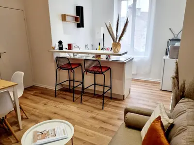 Coin salon dans l'établissement Meublés du chêne vert, cœur de Jarnac