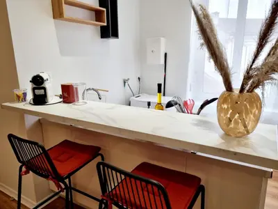 Cuisine ou kitchenette dans l'établissement Meublés du chêne vert, cœur de Jarnac