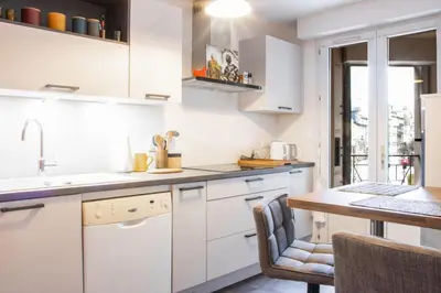 Cuisine ou kitchenette dans l'établissement Le Vintage - Grand Appartement hypercentre