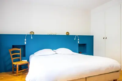 Un ou plusieurs lits dans un hébergement de l'établissement Le Vintage - Grand Appartement hypercentre
