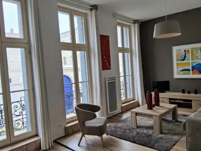 Coin salon dans l'établissement COSY ZEN HYPER CENTRE APARTMENT***