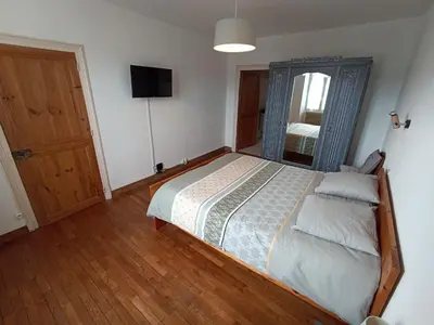 Un ou plusieurs lits dans un hébergement de l'établissement Maison de ville de 95M2