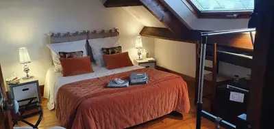 Un ou plusieurs lits dans un hébergement de l'établissement Le Noroit Chambres d'Hôtes