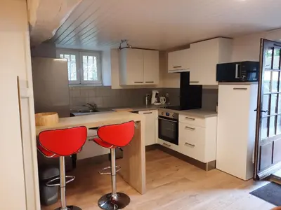 Cuisine ou kitchenette dans l'établissement Maison Cosy