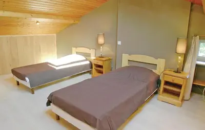 Un ou plusieurs lits dans un hébergement de l'établissement Amazing Home In Rioux