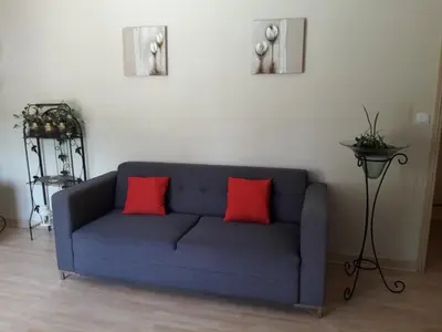 Coin salon dans l'établissement Logis de LANGE apt les Ecureuils