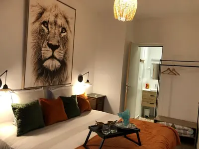 Coin salon dans l'établissement Le Logis de Virginie - climatisé
