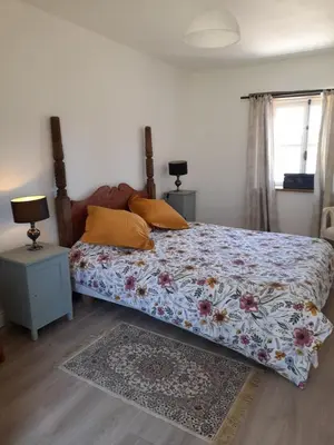 Un ou plusieurs lits dans un hébergement de l'établissement Butterfly Cottage