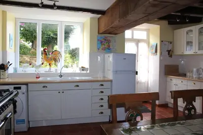 Cuisine ou kitchenette dans l'établissement La Maison du Passeur
