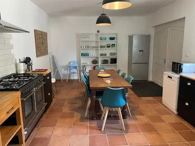 Cuisine ou kitchenette dans l'établissement La Maison du Petit Jacques - Mirabelle Cottage