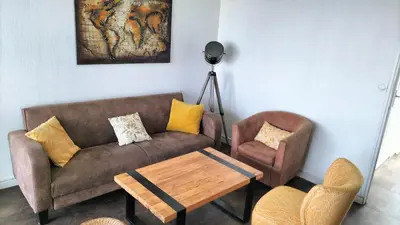Coin salon dans l'établissement Grand appartement lumineux vue mer