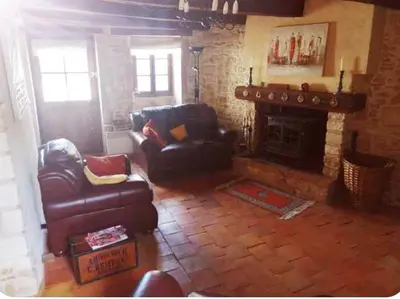 Coin salon dans l'établissement Two bedroom Stone Cottage