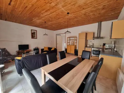 Cuisine ou kitchenette dans l'établissement La Maison des Grands Bambous - L'Angoumois L'Aunis La Saintonge La Boutonne