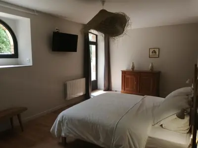 Un ou plusieurs lits dans un hébergement de l'établissement Chambres d'hôtes de la pilatière
