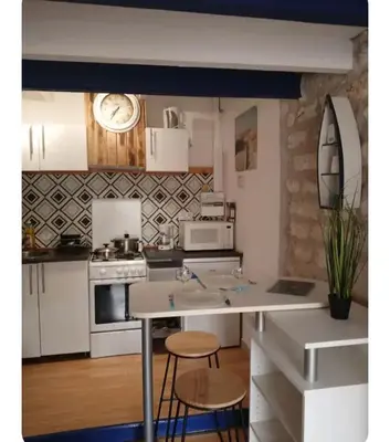 Cuisine ou kitchenette dans l'établissement Studio coconning proche de Fouras