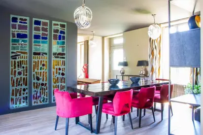 Coin salon dans l'établissement Les Olympiades - Magnifique Villa d'évasion