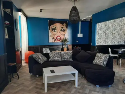 Coin salon dans l'établissement DUPLEX place du marché