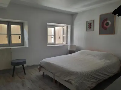 Un ou plusieurs lits dans un hébergement de l'établissement DUPLEX place du marché