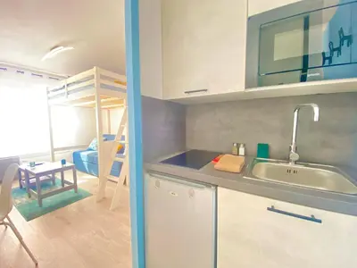 Cuisine ou kitchenette dans l'établissement Le Lagon à 2 min du Futuroscope