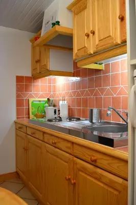 Cuisine ou kitchenette dans l'établissement Le Petit Massigny