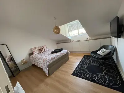 Un ou plusieurs lits dans un hébergement de l'établissement Grand Appartement Hypercentre avec Terrasse et Parking