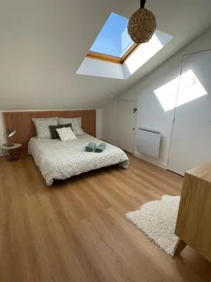Un ou plusieurs lits dans un hébergement de l'établissement Grand Appartement Hypercentre avec Terrasse et Parking