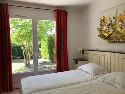 Un ou plusieurs lits dans un hébergement de l'établissement Villa in Les Forges with Golf & Pool Access