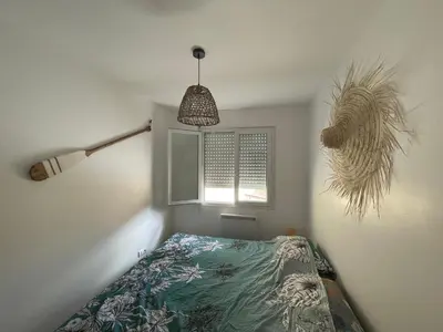 Un ou plusieurs lits dans un hébergement de l'établissement Charentaise 6-8 personnes avec piscine
