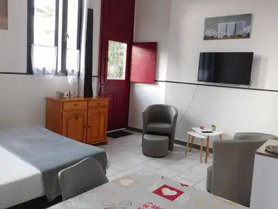 Télévision ou salle de divertissement dans l'établissement Studio Le Terminus