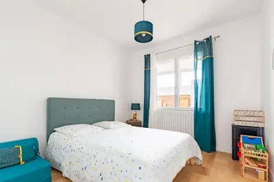 Un ou plusieurs lits dans un hébergement de l'établissement Maison de vacance à 15 minutes de Royan
