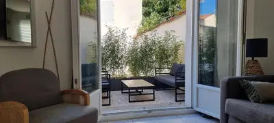 Coin salon dans l'établissement En hypercentre, Le Nature Zen - Appart avec terrasse entièrement rénové - Netflix - Amazon Prime -