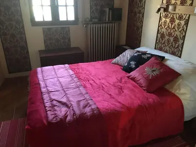 Un ou plusieurs lits dans un hébergement de l'établissement Boutonne Rouge Gite