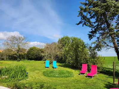 Jardin de l'établissement Maison chaleureuse et familiale.