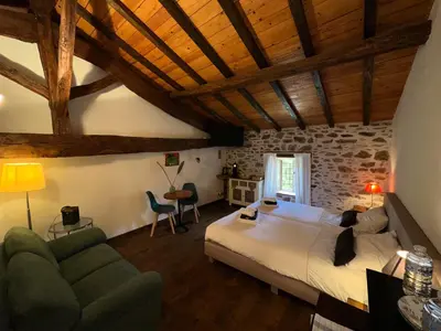 Un ou plusieurs lits dans un hébergement de l'établissement Domaine de Brise Bois - Chambres & Gîtes