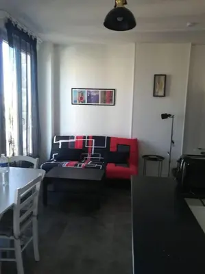 Coin salon dans l'établissement La Résidence immeuble proche place François 1er