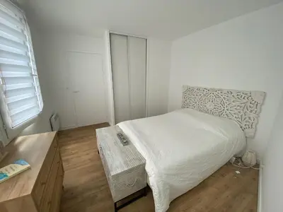 Un ou plusieurs lits dans un hébergement de l'établissement 2 pièces avec parking en Coeur de Ville - Appartement lumineux et calme